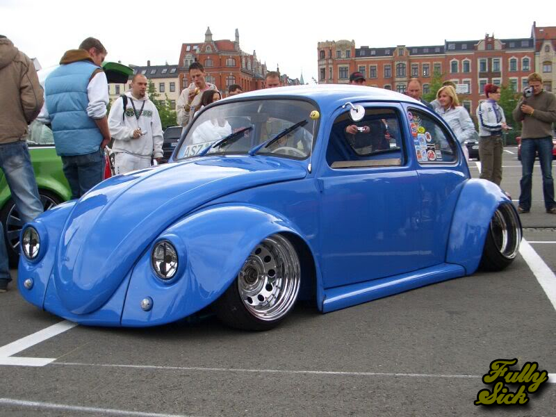 Slammed and on possibly the widest wheels I've seen on a street Bug 